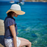 blue shirt, white shorts in Plaka, Crete