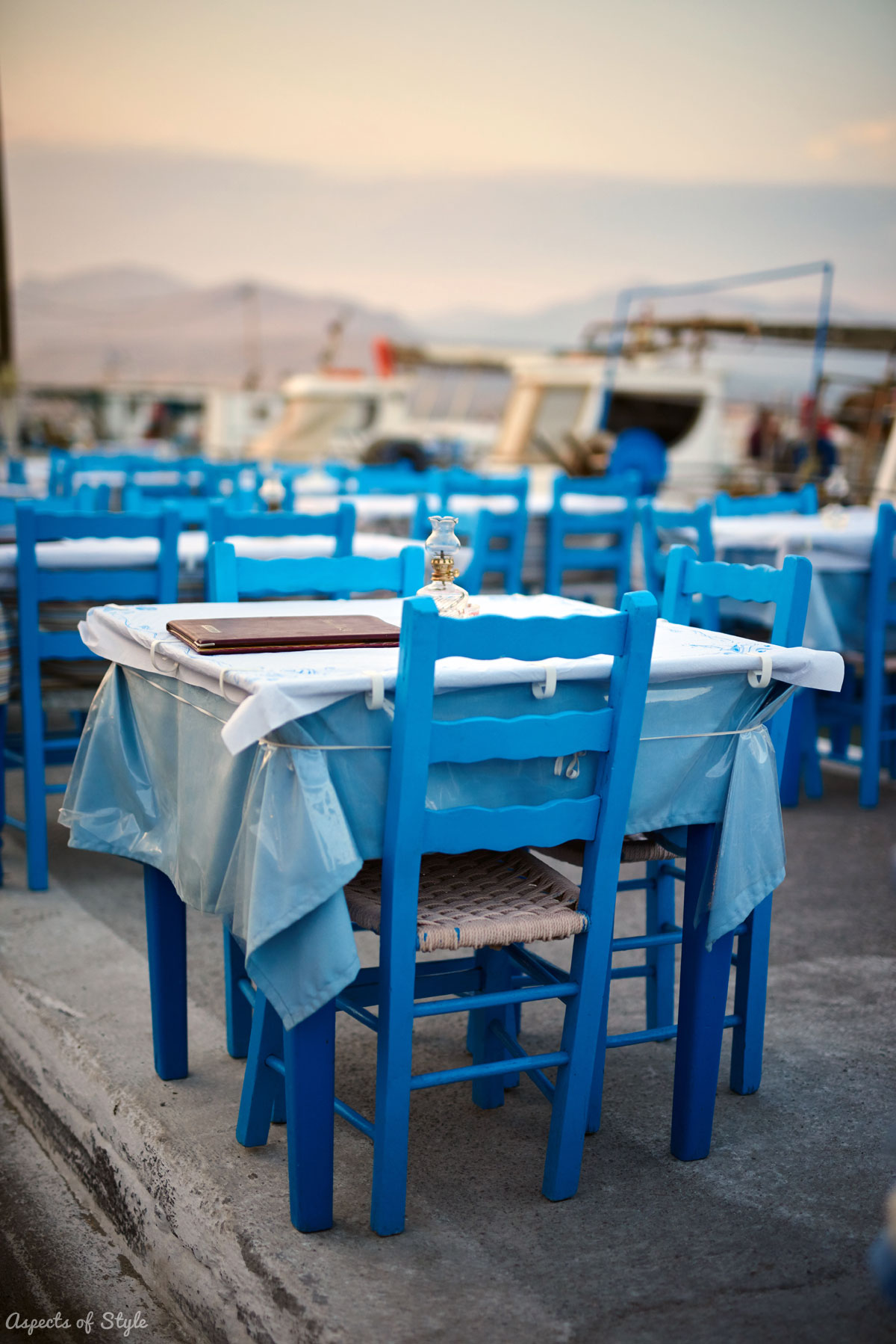Tables by the sea in Elafonisos port, Greece