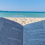 reading a book in Simos beach Elafonisos, Greece