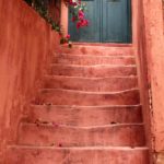 blush pink staircase in Chania, Crete