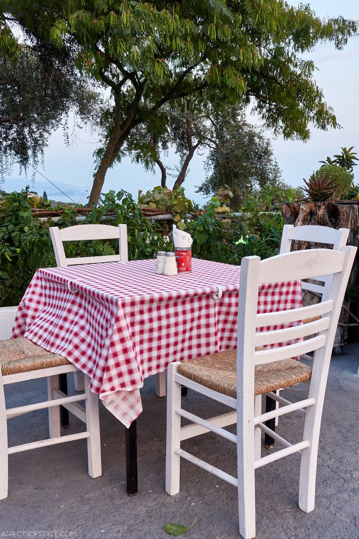 table, four chairs, table cloth