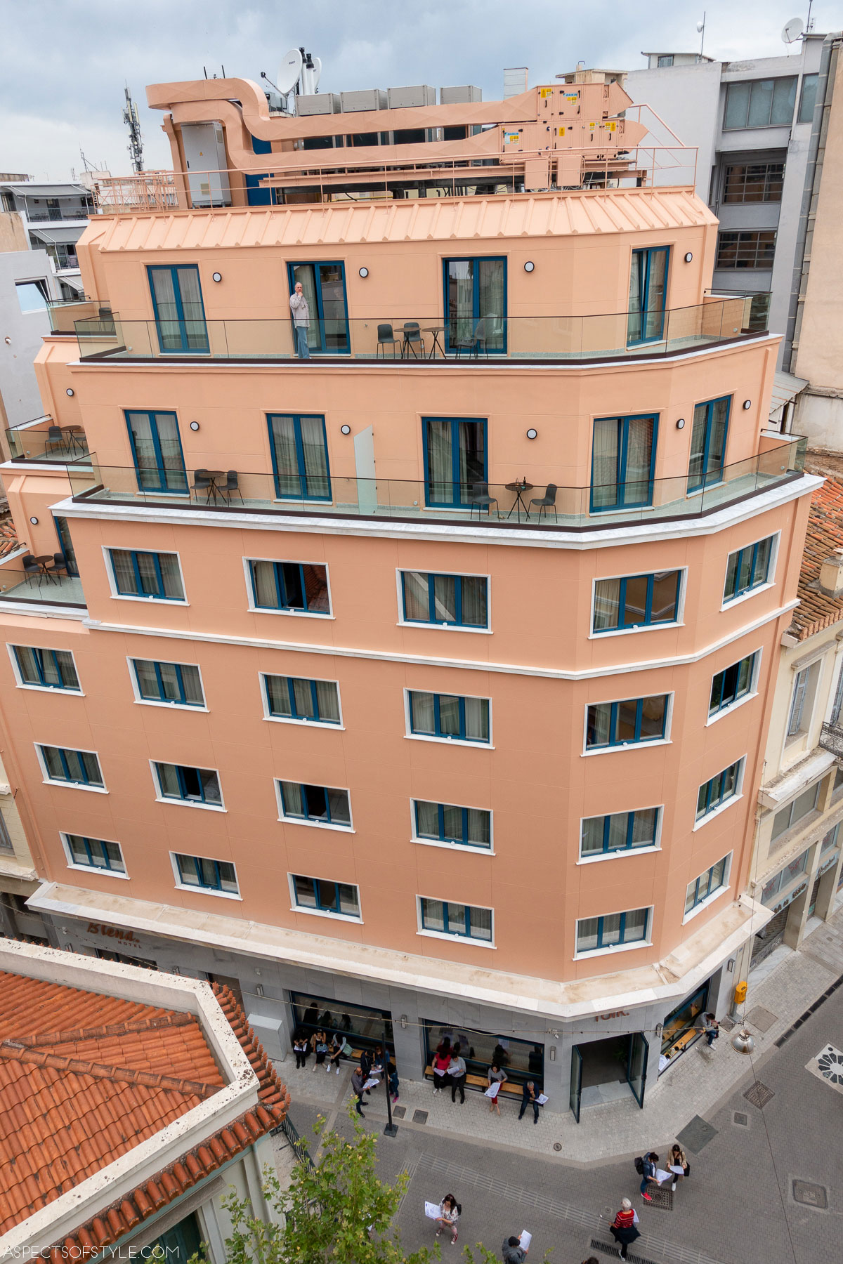 pink building with 6 floors