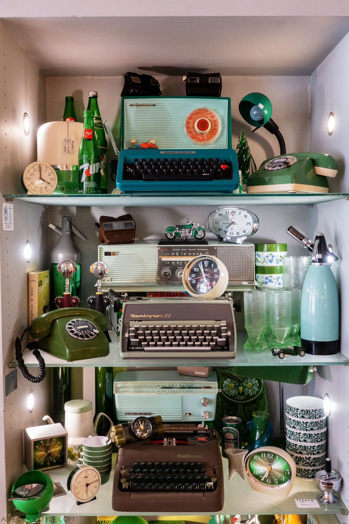 vintage telephones, typewriters and lamps