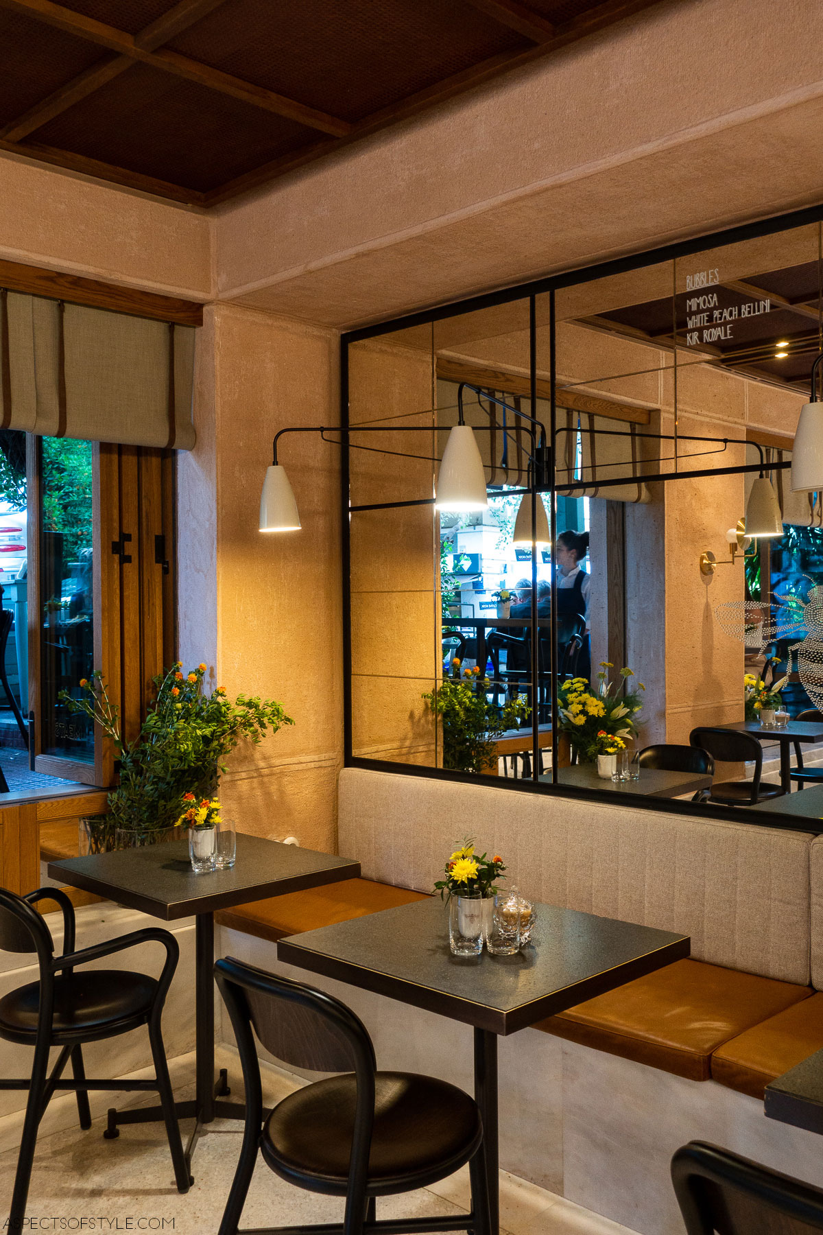 indoor cafe seating area at Queen Bee Athens