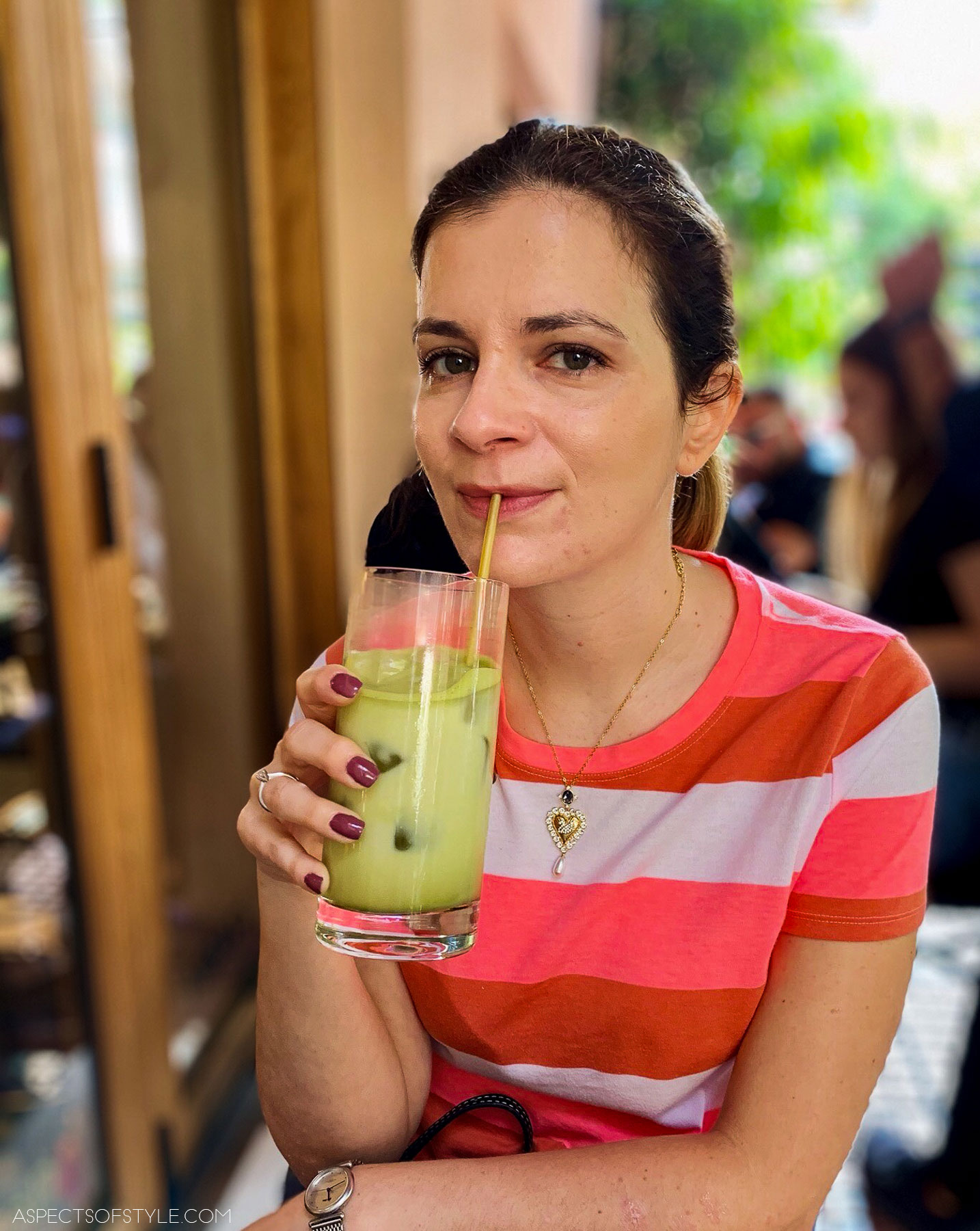 Anna drinking matcha latte