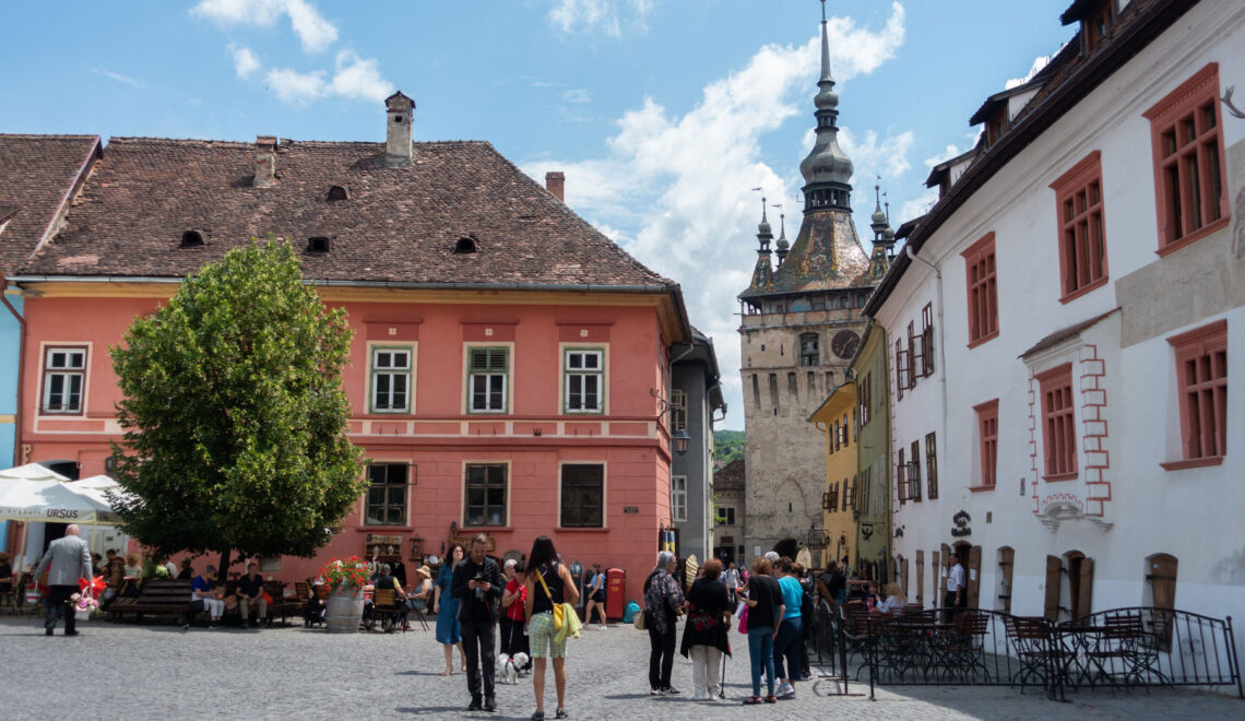 Sighisoara main square and Tower castle in Romania