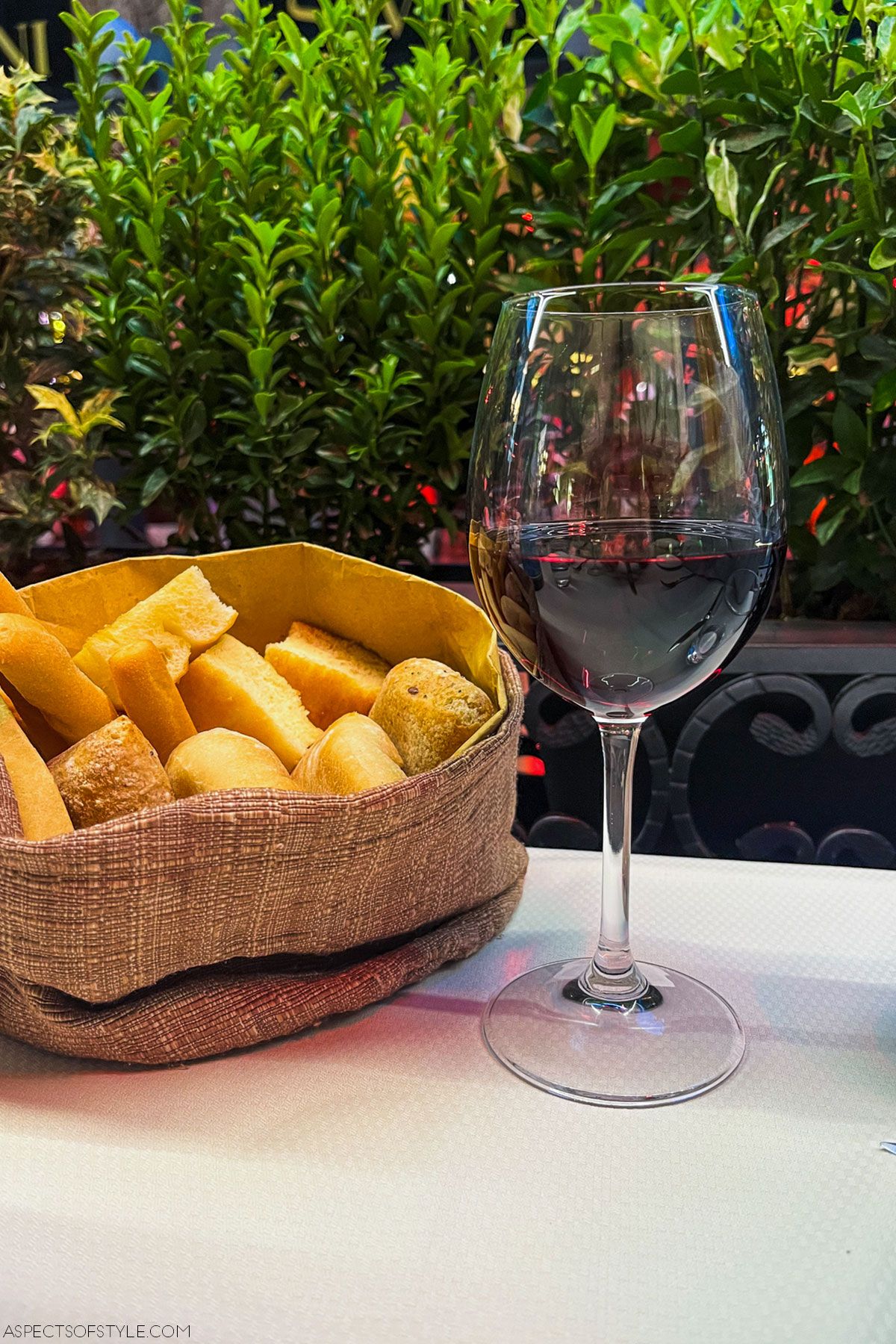 bread basket and wine at La Locanda Di Gatto Rosso restaurant, Milan