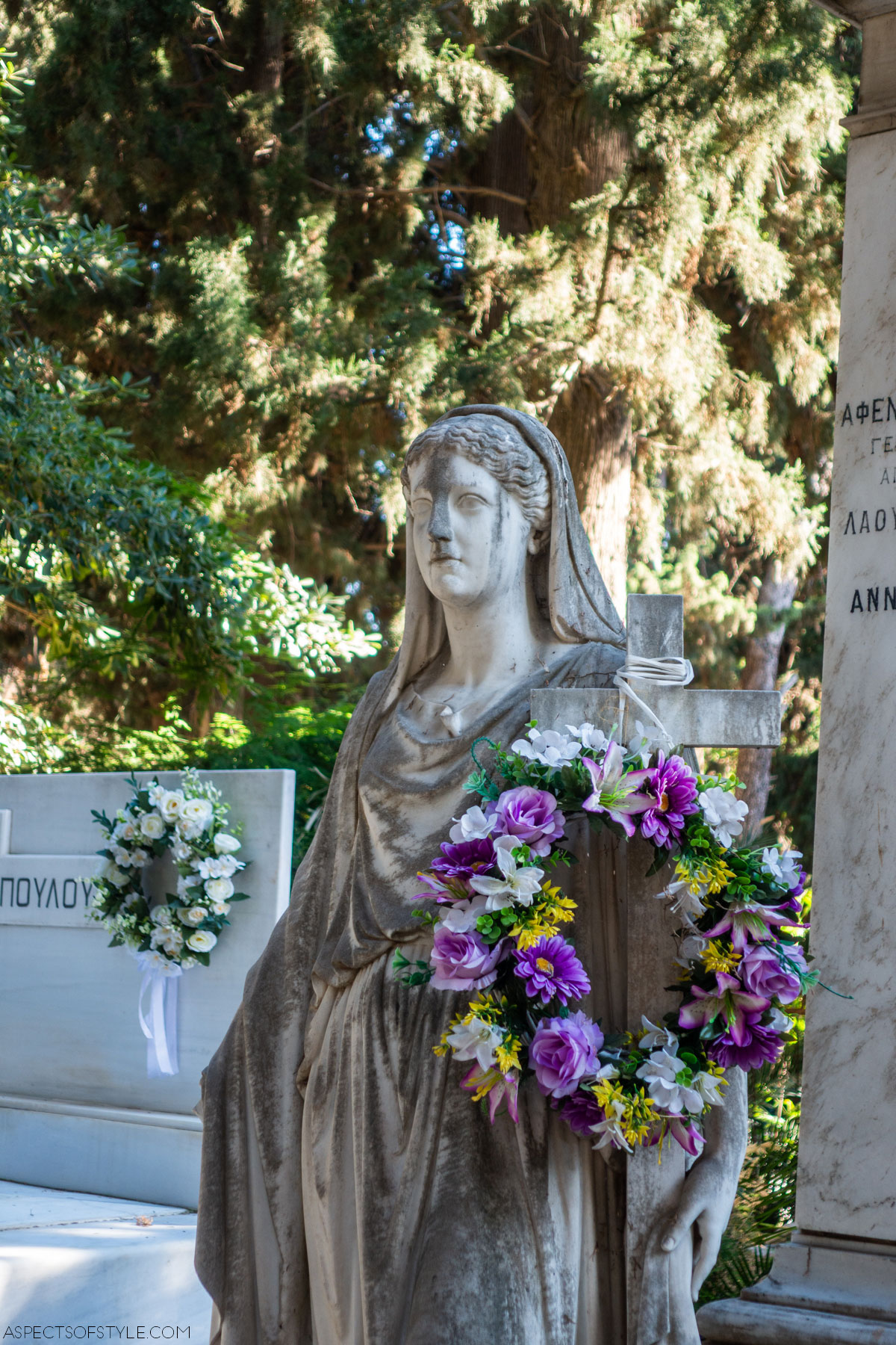 a female statue reminiscent of a Caryatid on Pantos family tomb, Athens First Cemetery