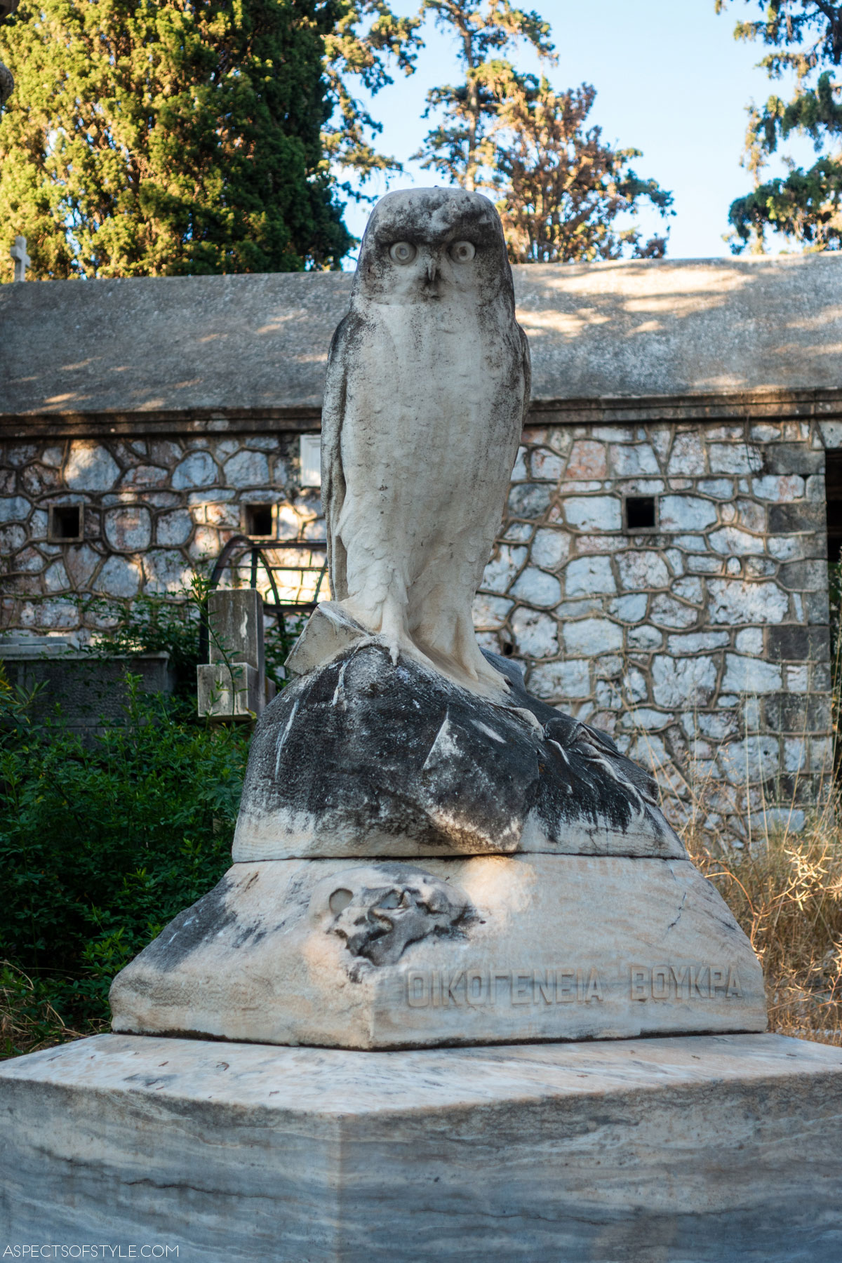 Voukras Family Tomb depicting an owl sitting on a scul, Athens First Cemetery