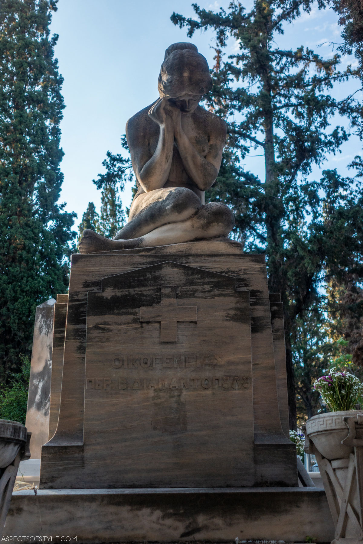 a tomb depicting a mourning naked woman belonging to Dimitrakopoulos family, Athens first cemetery